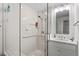 Bathroom with a glass-enclosed shower and white vanity at 701 Bennington Dr, Raleigh, NC 27615