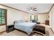 Bedroom with a blue bed, two windows and two wood-trimmed windows at 701 Bennington Dr, Raleigh, NC 27615