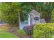 Stonebridge community entrance sign surrounded by lush landscaping and greenery at 701 Bennington Dr, Raleigh, NC 27615