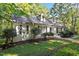 Attractive home with dormer windows, shutters, and lush landscaping at 701 Bennington Dr, Raleigh, NC 27615