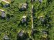 Birds eye view of several homes in a wooded neighborhood at 745 Oaks Lane Rd, Timberlake, NC 27583