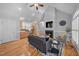 Cozy living room featuring a fireplace, vaulted ceilings and hardwood floors at 745 Oaks Lane Rd, Timberlake, NC 27583
