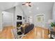 Inviting living room with fireplace and hardwood floors, great natural light at 745 Oaks Lane Rd, Timberlake, NC 27583