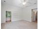 Spacious bedroom featuring built-in shelves, neutral carpet, and lots of natural light at 7801 Kingsbrook Ct, Wake Forest, NC 27587