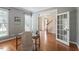 Home office with natural light and doorway to foyer at 7801 Kingsbrook Ct, Wake Forest, NC 27587