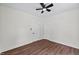 This bedroom features wood-look floors and a ceiling fan at 813 N Main St, Burlington, NC 27217