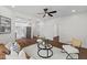 Stylishly decorated living room with comfortable seating and an open floor plan at 813 N Main St, Burlington, NC 27217