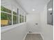 Bright room with multiple windows and tile flooring at 813 N Main St, Burlington, NC 27217