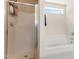 This bathroom includes a shower and bathtub at 822 Blue Lake Dr, Mebane, NC 27302