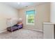 Cozy bedroom with a playful toddler bed, complemented by a bright window and a practical dresser at 822 Blue Lake Dr, Mebane, NC 27302