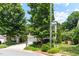 Charming two-story home featuring a well-manicured lawn, inviting curb appeal, and an attached two-car garage at 822 Blue Lake Dr, Mebane, NC 27302