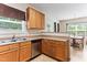 The functional kitchen offers ample cabinetry, countertops, and modern appliances for everyday convenience at 822 Blue Lake Dr, Mebane, NC 27302