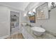 Bright bathroom with double sinks, a granite countertop, and views to the bedroom at 8416 Davishire Dr, Raleigh, NC 27615