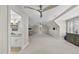 Bonus room features a ceiling fan, carpet, and an attached bathroom with a vanity at 8416 Davishire Dr, Raleigh, NC 27615