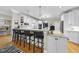 Bright and modern kitchen featuring a large island with seating and plenty of counter space at 8416 Davishire Dr, Raleigh, NC 27615