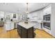 Well-equipped kitchen with granite countertops, subway tile backsplash, and stainless steel appliances at 8416 Davishire Dr, Raleigh, NC 27615