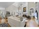 The living room has a vaulted ceiling, lots of light, and fireplace at 8416 Davishire Dr, Raleigh, NC 27615