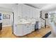 Functional office nook with custom cabinetry and countertops, located near the stairway at 8416 Davishire Dr, Raleigh, NC 27615