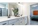 Elegant bathroom with double vanity, glass-enclosed shower, and stylish decor at 88 Freedom Heights Ln # 148, Smithfield, NC 27577