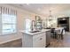 Bright kitchen featuring a sink, stainless steel appliances and views of the living space at 88 Freedom Heights Ln # 148, Smithfield, NC 27577