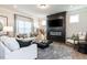 Inviting living room showcasing a modern fireplace, comfortable seating, and stylish decor at 88 Freedom Heights Ln # 148, Smithfield, NC 27577