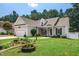 Well-maintained one-story home with a manicured lawn, beautiful landscaping, and an attached two-car garage at 904 E Ivy Valley Dr, Fuquay Varina, NC 27526