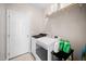 Practical laundry room with modern washer and dryer, providing convenience for household chores at 904 E Ivy Valley Dr, Fuquay Varina, NC 27526