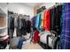 Organized walk-in closet featuring ample hanging space and shelving for optimal storage solutions at 904 E Ivy Valley Dr, Fuquay Varina, NC 27526
