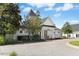 Attractive clubhouse featuring manicured landscaping, elegant architectural details, and easy access from a circular driveway at 904 Parkridge Dr, Clayton, NC 27527