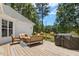 Wooden deck complete with outdoor seating and a grill, perfect for entertaining at 904 Parkridge Dr, Clayton, NC 27527