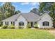 Charming one-story home with a manicured lawn and mature landscaping enhancing its curb appeal at 904 Parkridge Dr, Clayton, NC 27527