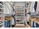 Spacious walk-in closet featuring custom shelving for shoes and clothing storage at 904 Parkridge Dr, Clayton, NC 27527