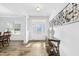 Bright foyer featuring wood floors, high ceilings, and elegant console table at 93 Kinsale Ct, Garner, NC 27529