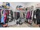 Organized walk-in closet offering ample storage space for clothing, shoes, and accessories at 93 Kinsale Ct, Garner, NC 27529