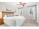 Comfortable bedroom with neutral carpet, ceiling fan, and natural light at 1008 Alderleaf Dr, Fuquay Varina, NC 27526
