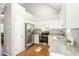 Spacious kitchen featuring granite counters and stainless steel appliances at 1008 Alderleaf Dr, Fuquay Varina, NC 27526