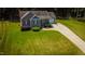 Aerial view of a single-story home featuring well-manicured front yard at 102 Bluegrass Dr, Oxford, NC 27565