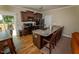 Kitchen featuring wooden cabinets, granite countertops, stainless steel appliances, and a breakfast bar at 102 Bluegrass Dr, Oxford, NC 27565