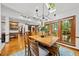 Dining room with a skylight that connects to other living spaces at 1030 W Sterlington Pl, Apex, NC 27502