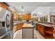 Bright kitchen with stainless appliances, ample cabinet space, butcher block island, and multiple skylights at 1030 W Sterlington Pl, Apex, NC 27502