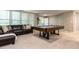 Recreation area with a pool table, comfortable seating, and plenty of space for entertaining at 104 Warley Cir, Cary, NC 27513