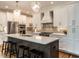 Spacious kitchen with stainless appliances, a center island, and pendant lighting at 104 Warley Cir, Cary, NC 27513
