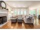 Bright living room features a fireplace and a large comfortable sectional sofa at 104 Warley Cir, Cary, NC 27513