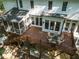Exterior elevated view showcasing the deck, porch, and wooded outdoor living spaces at 104 Warley Cir, Cary, NC 27513