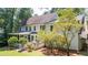 A home's backyard featuring a lush lawn, patio, and sunroom at 10625 Soma Ct, Raleigh, NC 27613