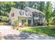 Charming two-story home featuring classic black shutters, dormer windows and a well-maintained, landscaped yard at 10625 Soma Ct, Raleigh, NC 27613