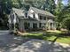 Beautiful traditional two-story home featuring a welcoming entrance and lush landscaping at 10625 Soma Ct, Raleigh, NC 27613