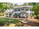 Traditional two-story home with a well-manicured front lawn at 10625 Soma Ct, Raleigh, NC 27613