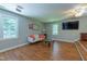 Inviting living room with hardwood floors, ideal for relaxing or entertaining guests at 10625 Soma Ct, Raleigh, NC 27613