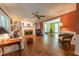 Bright living room features a fireplace, built-in shelving, and beautiful flooring, perfect for entertaining or relaxing at 10625 Soma Ct, Raleigh, NC 27613